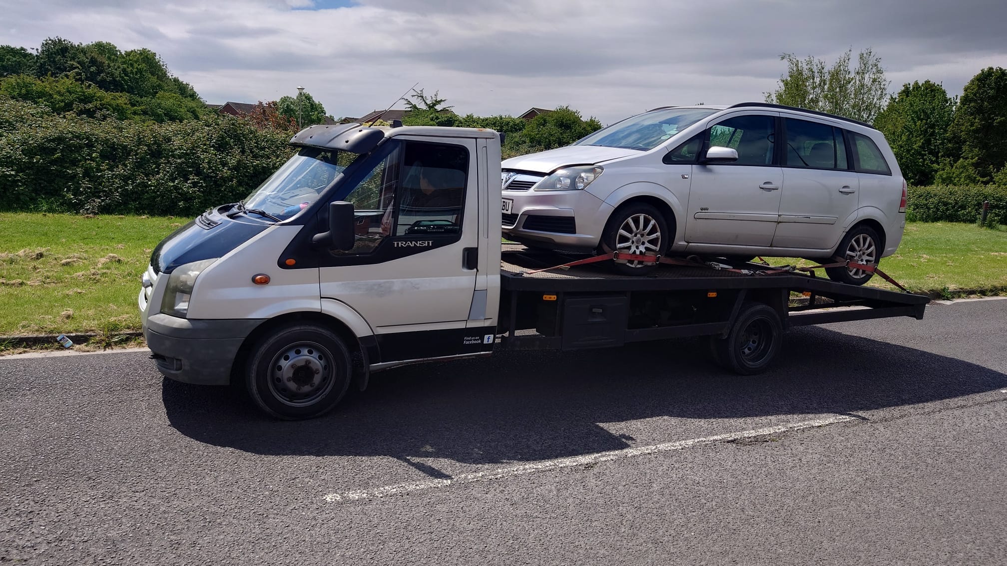 Marshall & Son truck carrying a vehicle near North Somerset